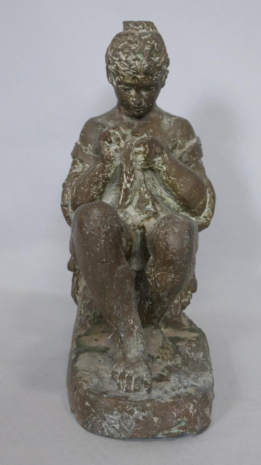 A bronze effect fibre glass figure of a seated girl sewing, indistinctly signed. H.33cm - Image 2 of 3