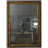 A C.1900 gesso framed pier mirror with floral decoration. H.97 W.70cm