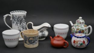 Three Oriental style teapots along with various ceramic items (8). H.14.5cm