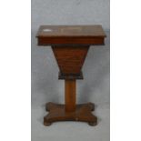 A 19th century walnut sewing table with central inlaid micro mosaic panel and fitted interior on