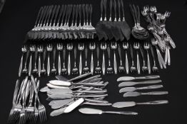 An extensive collection of Christofle cutlery to include forks x12, fish knives x23, small forks