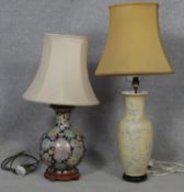 A baluster shaped Chinese style table lamp and shade along with a similar example. H.83cm