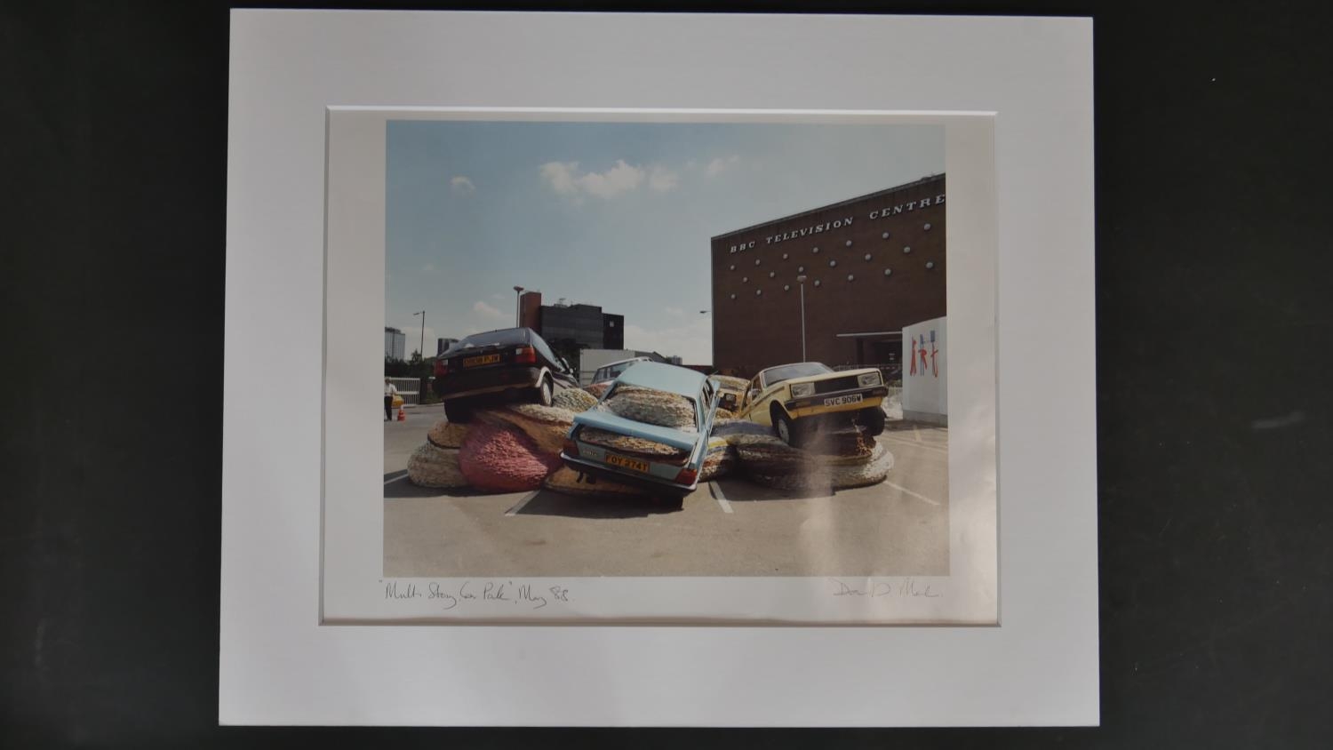 A signed coloured photo by Scottish artist David Mach of his sculpture Multi Story Car Park, May, - Image 2 of 4