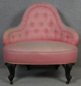 A late 19th century bedroom chair in buttoned damask upholstery on mahogany carved cabriole