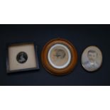 Two 19th century oval watercolour miniature portraits and a framed daguerreotype. H.17 W.14cm (