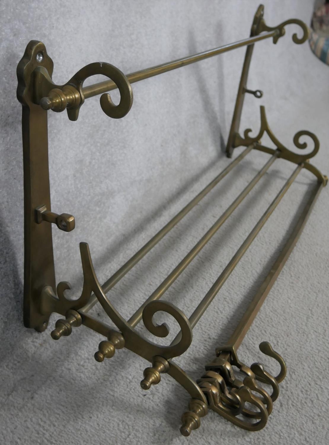 A 19th century brass wall mounted kitchen utilities rack and a heavy brass Victorian swing handled - Image 4 of 6