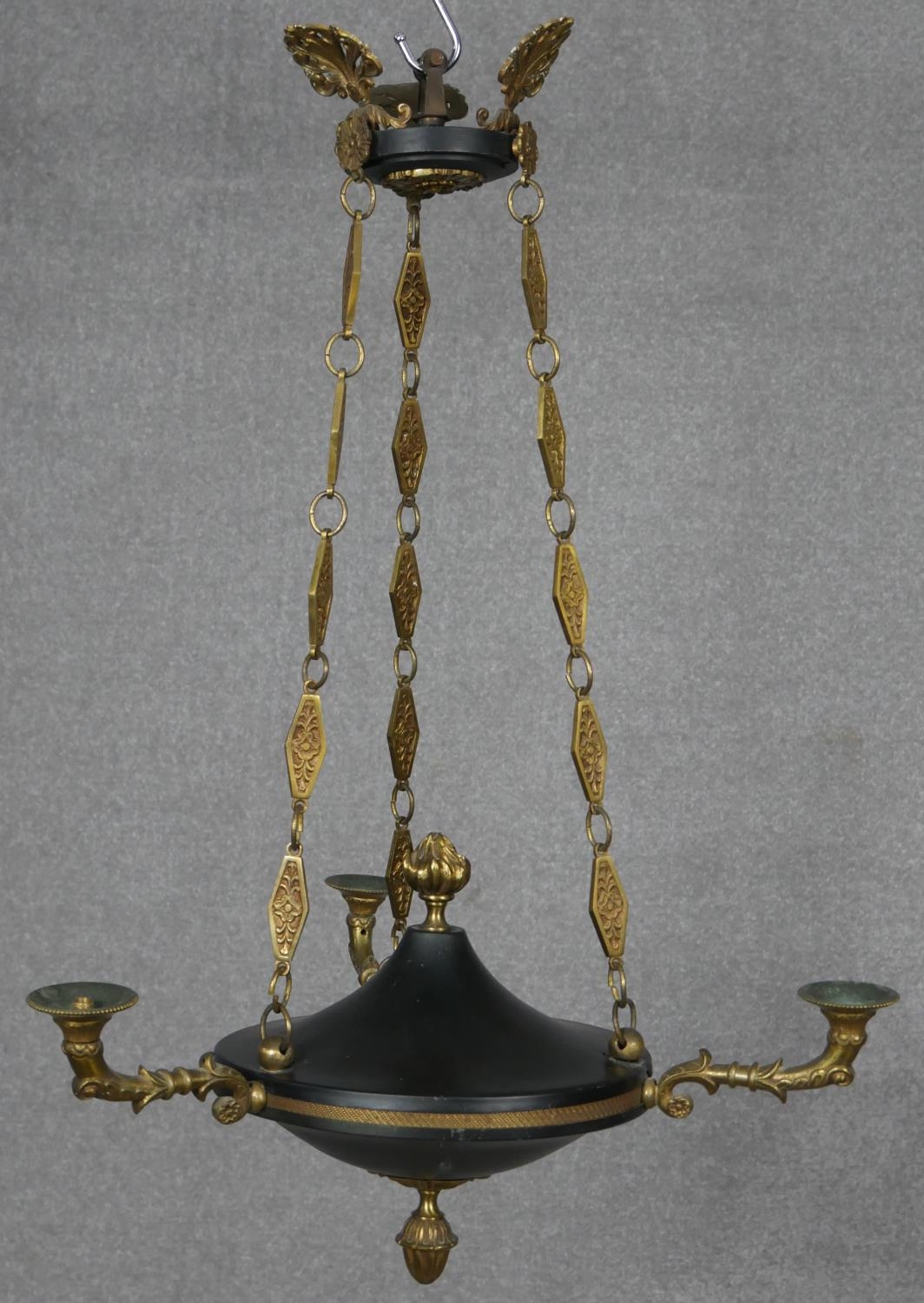 An antique brass and metal three branch ceiling chandelier along with a gilt five branch chandelier. - Image 2 of 15