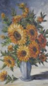 A framed oil on canvas, sunflowers in a vase, signed Van Dam. H.81 W.55.5cm