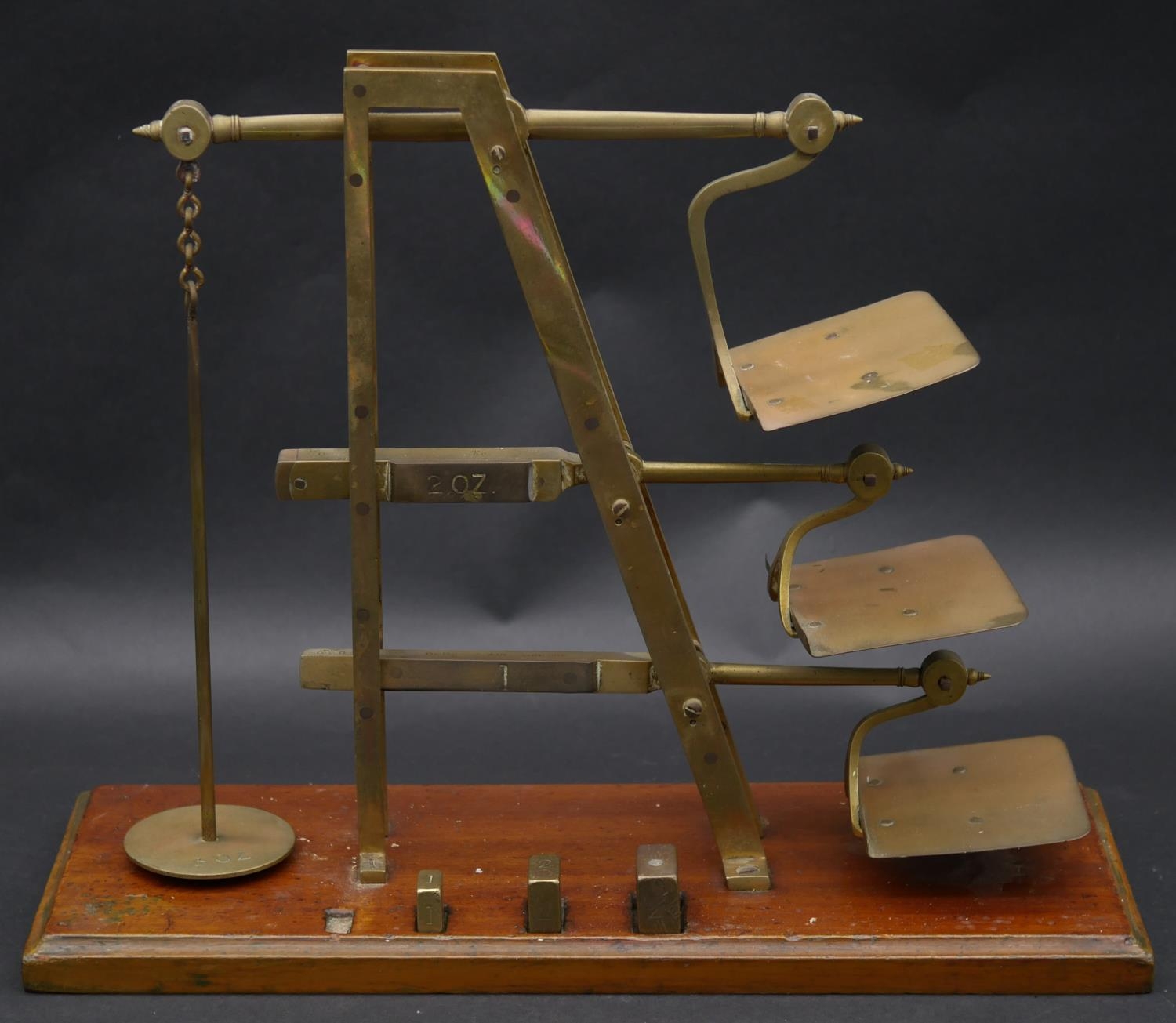 A set 19th century GPO brass triple ladder letter scales stamped De Grave & Co, London. H.33 L.41