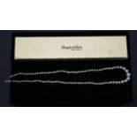 A cultured graduated pearl necklace with silver hook and push clasp with a Mappin & Webb box. L.49cm