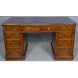 A late 19th century burr elm three section desk with inset gilt tooled leather top on twin pedestals
