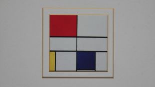 A framed and glazed print of Mondrian's 'Composition of Red and Blue. H.41 W.41cm