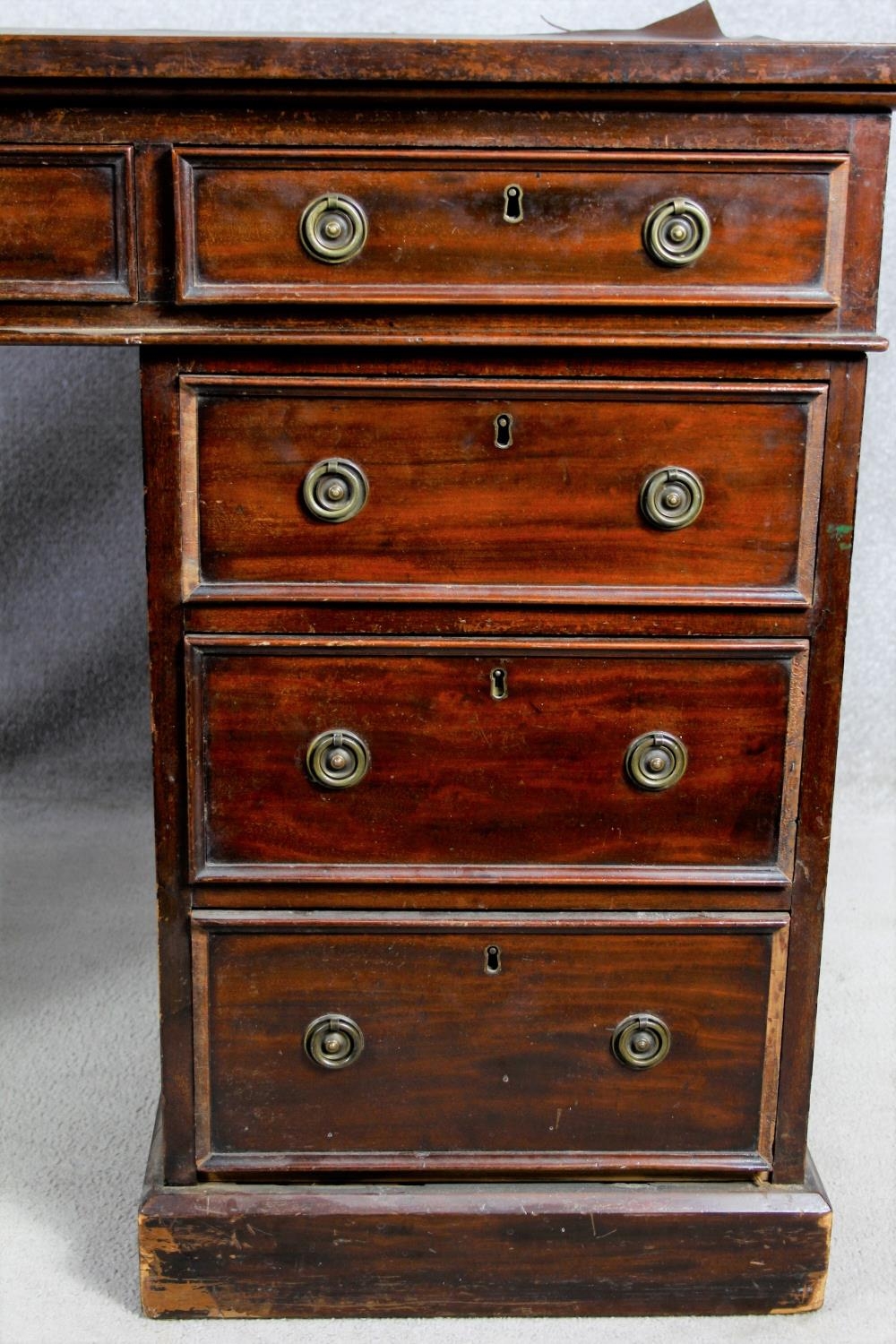 A 19th century three part mahogany pedestal desk with an arrangement of nine drawers on plinth base. - Image 2 of 14