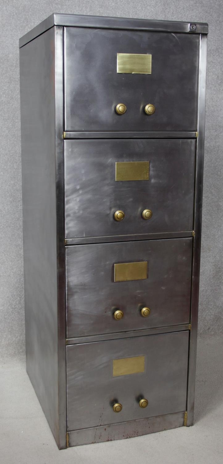 A vintage polished steel filing cabinet with twin brass handles and brass plate to each drawer. H. - Image 2 of 11