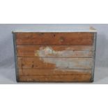 A vintage metal bound travelling trunk with twin carrying handles. H.73 W.92 D.46cm