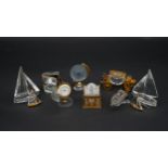 A collection of ten Swarovski crystal memories. Including a Swarovski crystal Memories secrets globe