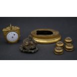 A French gilt metal grape basket clock and other clock mount pieces. The clock has white enamel dial