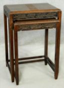 A nest of two Chinese carved hardwood occasional tables. H.56 W.46 D.35