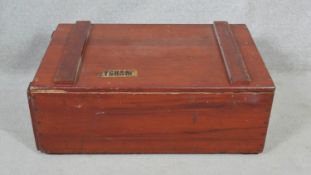 A C.1900 travelling bookcase/cabinet with twin metal carrying handles. H.31 L.85.5 W.54.5cm