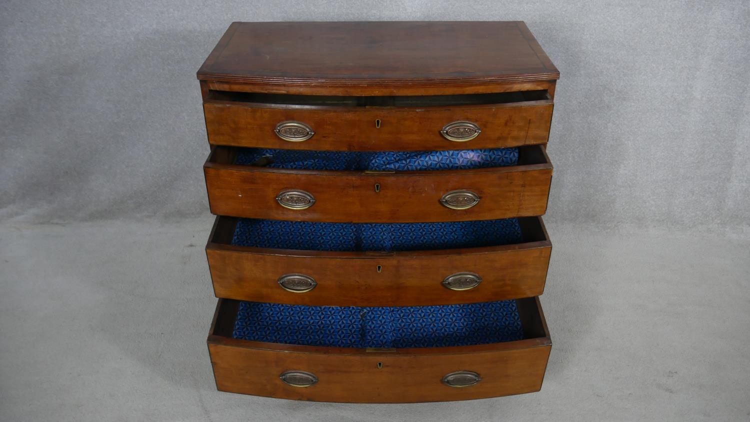 A Regency mahogany bowfronted chest of drawers with crossbanded and ebony strung top on swept - Image 2 of 3