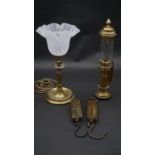 A vintage brass table lamp, a railwayman's storm lantern marked GWR and two brass spring scales. H.