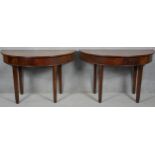 A Georgian mahogany dining table with two D-ends to form a circular table (it comes with original