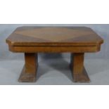 A mid century Art Deco style oak, teak and walnut segment veneered draw leaf dining table H.76 L.251