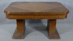 A mid century Art Deco style oak, teak and walnut segment veneered draw leaf dining table H.76 L.251