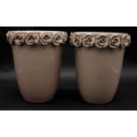 A pair of contemporary ceramic glazed vases with sculpted roses around the rim. H.25cm