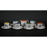A Susie Cooper for Wedgwood coffee set, Black Fruit pattern, marked to base; six coffee cans and
