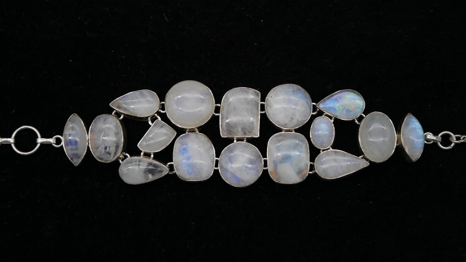 A collection of costume jewellery. Including a rainbow moonstone cabochon articulated silver - Image 2 of 9