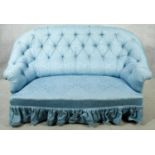 A vintage tub shaped two seater sofa in deep buttoned damask upholstery. H.94 W.150 D.90cm