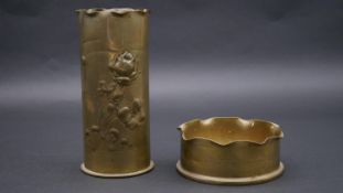 Two Trench Art brass planters. H.19.5cm