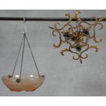 An Art Deco style opaque glass ceiling light pendant shade and a vintage gilt metal ceiling light