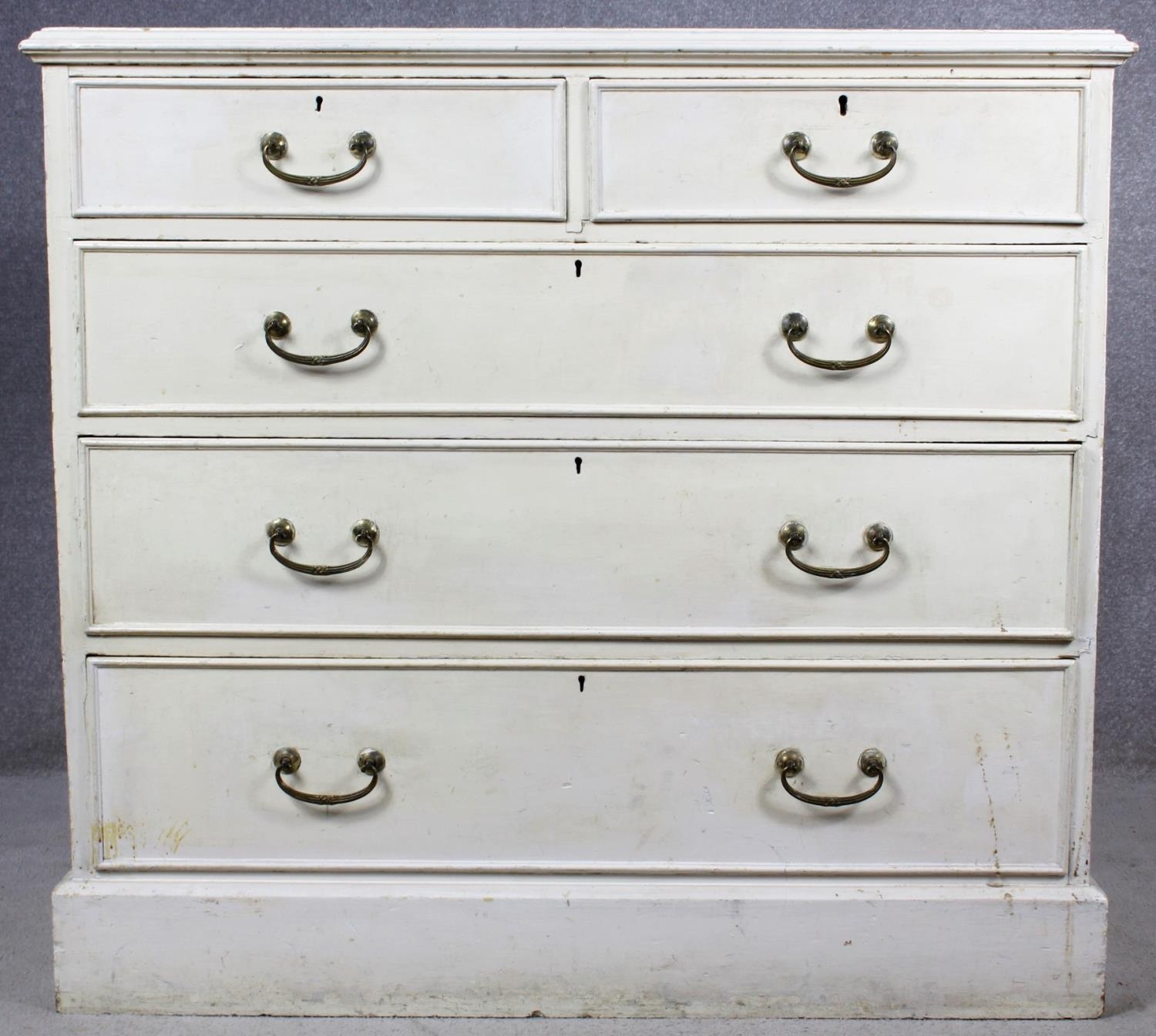 A 19th century later painted chest of two short over three long drawers on plinth base. H.87 W.104