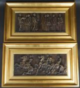 A pair of gilt framed bronzed plaster relief panels, Roman figures and cavalrymen. H.33 W.57cm