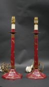 A pair of hand decorated toleware table lamps. H.47cm