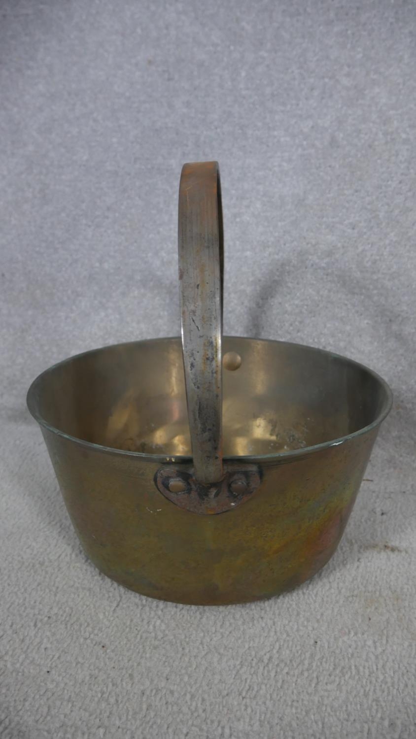 A 19th century brass wall mounted kitchen utilities rack and a heavy brass Victorian swing handled - Image 6 of 6