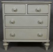 A Victorian style painted chest of two short above two long drawers on turned supports. H.77 W.76