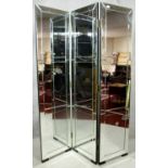 A two fold room divider with three mirrored panels each with bevelled and glazed framed sections.