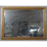 A rectangular wall mirror in painted moulded frame. H.84.5 W.114.5cm