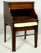 A vintage mahogany telephone table with pull out seat with Chippy Telephone Seats maker's mark. H.69