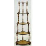 A Georgian style mahogany five tiered corner whatnot. H.140 W.54 D.36cm