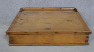 A pine clerk's writing slope with galleried top and hinged lid enclosing storage compartment. H.23