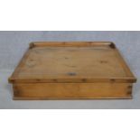 A pine clerk's writing slope with galleried top and hinged lid enclosing storage compartment. H.23