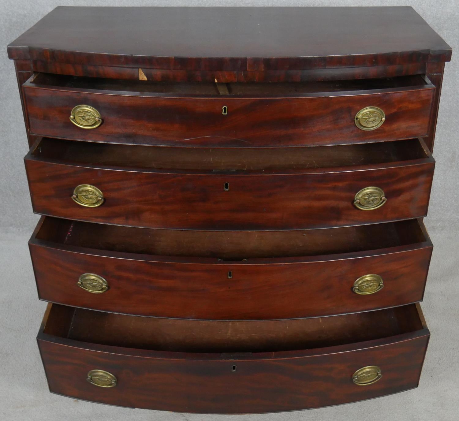 A 19th century mahogany bowfronted chest of four long drawers flanked by reeded pilasters on - Image 3 of 10