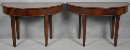 A Georgian mahogany dining table with two D-ends to form a circular table (it comes with original