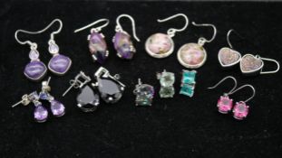 Ten pairs of gemset silver earrings with seven certificates. To include five pairs of drop