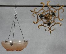 An Art Deco style opaque glass ceiling light pendant shade and a vintage gilt metal ceiling light