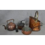 A brass and copper coal scuttle, a copper pan and teapot, a vintage coffee grinder and a 2lb weight.